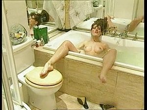 One girl masturbating while spying on another girl masturbating